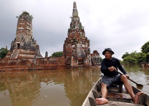 24 hours: Ayutthaya province, Thailand: A Thai resident paddles his boat 