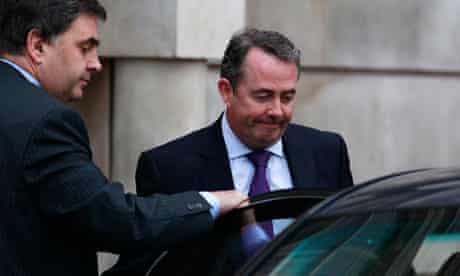 Britain's Defence Secretary Liam Fox leaves his residence in central London
