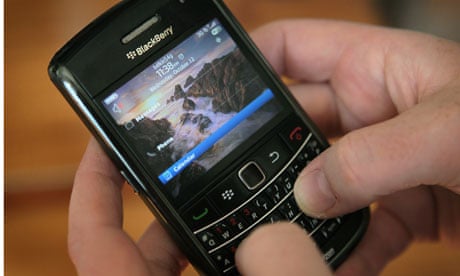 A BlackBerry owner in the US tries to use his phone 