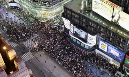 Occupy Wall Street protesters take part in a demonstration at Times Square in New York.