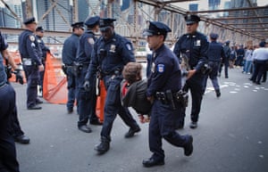 Occupy Wall Street: Police arrest and carry a protestor away, Brooklyn Bridge