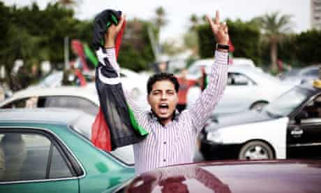 Libyan youth celebrates after Muammar Gaddafi's death