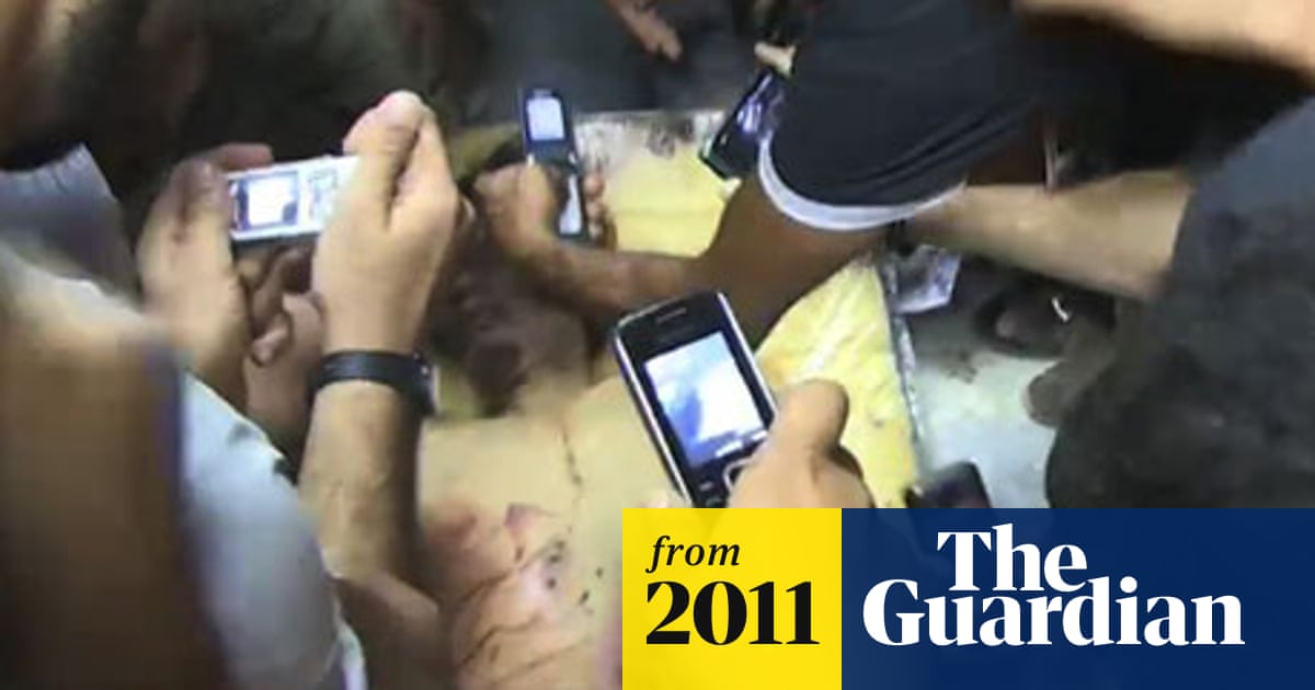 Muammar Gaddafi S Trophy Body On Show In Misrata Meat Store World News The Guardian