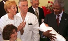 Kofi Annan holds newborn Adnan Nevic
