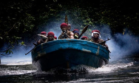 Militants of the Movement for the Emancipation of the Niger Delta travelling between camps.
