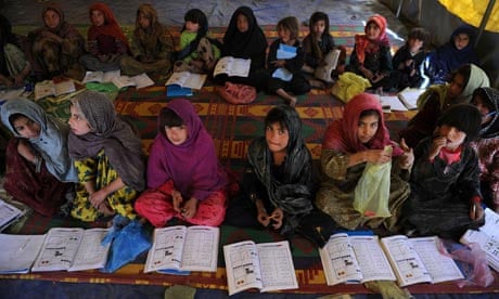 Afghan Kuchi girls attend lessons