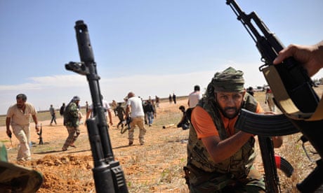 Libyan forces under fire from Gaddafi loyalists in Sirte