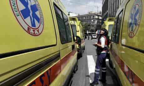 Ambulance crews join doctors and health workers to protest against cuts outside the Greek parliament
