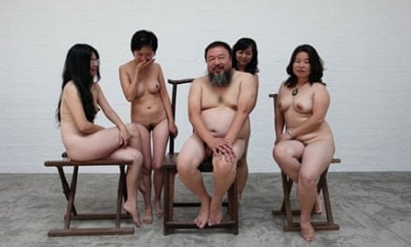 The Chinese artist Ai Weiwei poses with nude women in Beijing