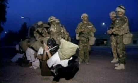 British troops round up suspected Ba'ath party activists in Basra, Iraq