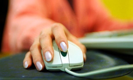 A woman using a PC computer mouse