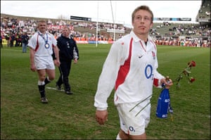 Jonny Wilkinson Retires: Jonny Wilkinson carries aff a rose given to him by a member of the crowd