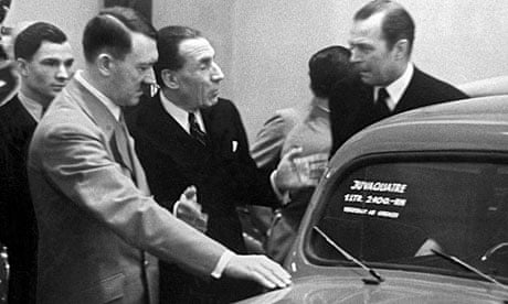 Louis Renault (centre) with Adolf Hitler and Hermann Göring at the Belin auto show in 1937