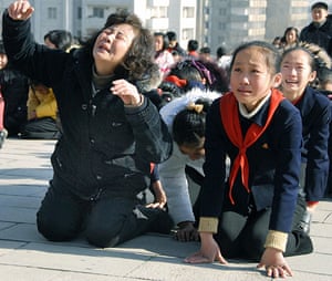 Reaction to Kim Jong il: Pyongyang residents react as they mourn over the death of Kim Jong-il
