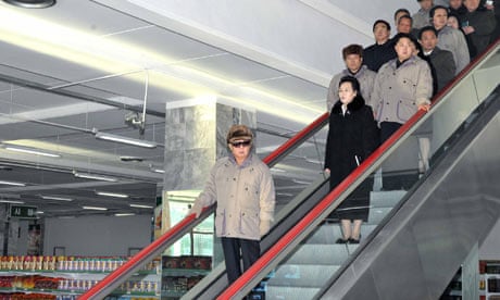 Kim Jong-il on an escalator
