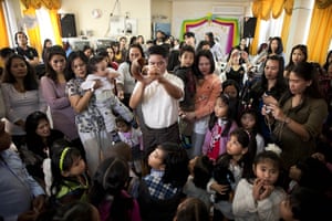 Hanukkah: Migrant workers from the Philippines celebrate a Christmas-Hanukkah party