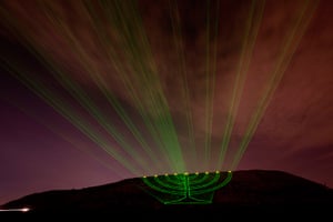 Hanukkah: Laser beams creating the image of a menorah at Ariel Sharon Park