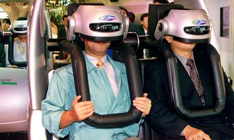 Japanese men enjoying virtual reality driving