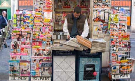 Newspaper seller in a London street
