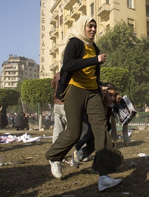 Battle for Egypt: Demonstrators for and against the government clash in Cairo