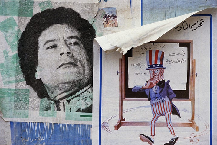 Muammar Gaddafi : Posters of Libyan leader Muammar Gaddafi and Uncle Sam in 1986