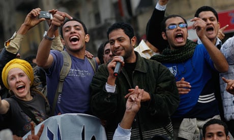 Protesters sing in Tahrir Square in Cairo