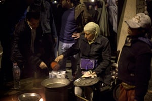 Egypt day 14: A woman makes tea for anti-Mubarak protesters at Tahrir Square
