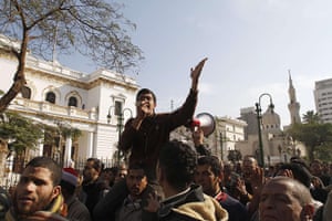 Egypt protests day 16: Anti-government protesters gather outside the Parliament gates