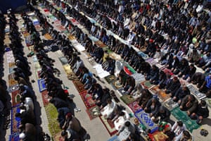 Benghazi Protests: Anti-Gaddafi protesters attend Friday prayers in Benghazi
