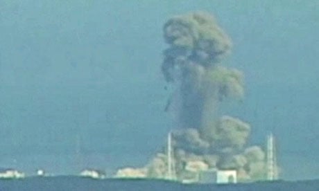 Smoke rises from Fukushima Daiichi nuclear power complex in this still image from video footage