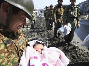 japan disaster aftermath: four-month-old baby girl rescued in Ishinomaki 