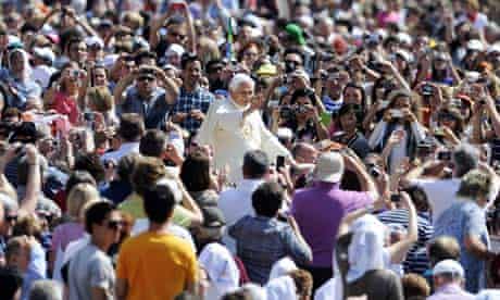 Pope Benedict XVI is driven through the crowd in St Peter's Square, Vatican City
