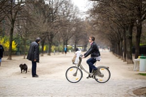 New Europe, France: Cyclist on velib hire bike, Paris, France