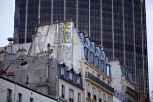 New Europe, France: Older building dwarfed by the adjacent Montparnasse tower, Paris, France