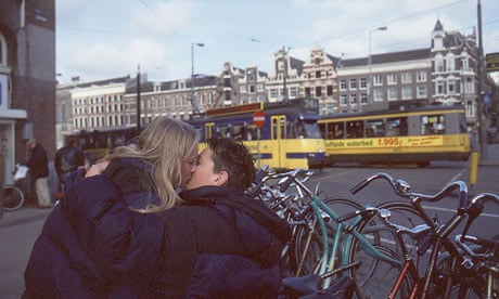 Teenage couple kissing in Amsterdam