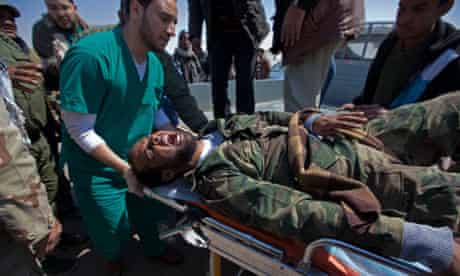 Libyan rebel fighter transferred to ambulance