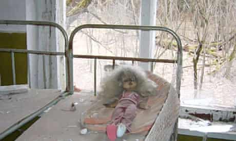 Chernobyl's legacy: a crackened and blackened doll in a classroom in the village of Kopachi.