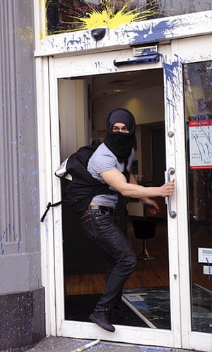 London Protest: Protesters smash the windows of HSBC bank in Cambridge Circus