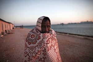 Refugees Flee Libya: A Bangladeshi worker who had been waiting to leave Libya