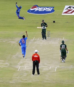 India v Pakistan: India's captain Dhoni celebrates taking catch off Pakistan's Hafeez 