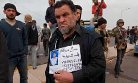 Libyan father Mohammed Ahmed Boulika looks for his son, Ahmed Mohammed, in Ras Lanuf
