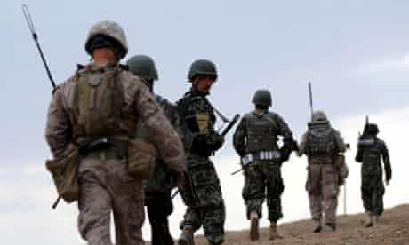 Afghan and American soldiers on patrol in Afghanistan