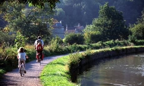 Cyclists on towpath Bath to Bradford on Avon canal