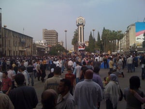 Syria protests: People gather at Clock Square during a demonstration in Syrian city of Homs