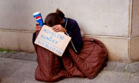 Young person homeless hungry and begging in London.