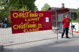 Christiania Copenhagen: An inhabitant of Copenhagen's 'free city' of Christiania at the entrance