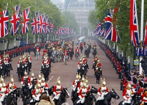 Wedding procession: The royal procession make their way down The Mall to Buckingham Palace