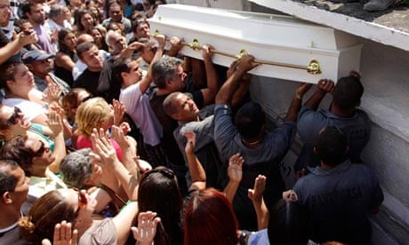 Relatives and friends of shooting victim Larissa Silva Martins attend her funeral in Rio