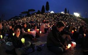 Beatification: Pilgrims hold a candles during a prayer vigil at Circus Maximus Rome 