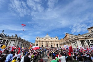 Beatification: Pilgrims celebrate as the banner of Pope John Paul II is uncovered